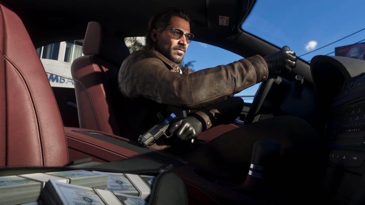 Raul at the wheel of a parked car in gloves and sunglasses, a pistol in his lap and banded cash stacked on the seat beside him.