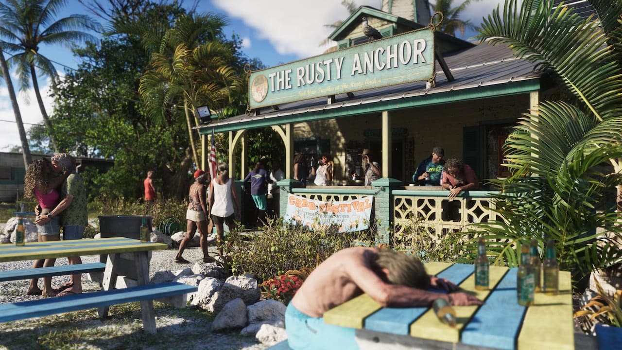 The Rusty Anchor, a timber bar in the Keys under palms, a crab festival banner on its rail and drinkers on the porch.
