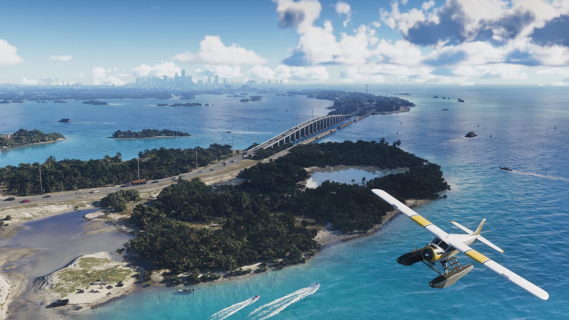 An aerial view of the Leonida Keys, a highway bridge running between wooded islands with a seaplane in flight and the Vice City skyline on the horizon.