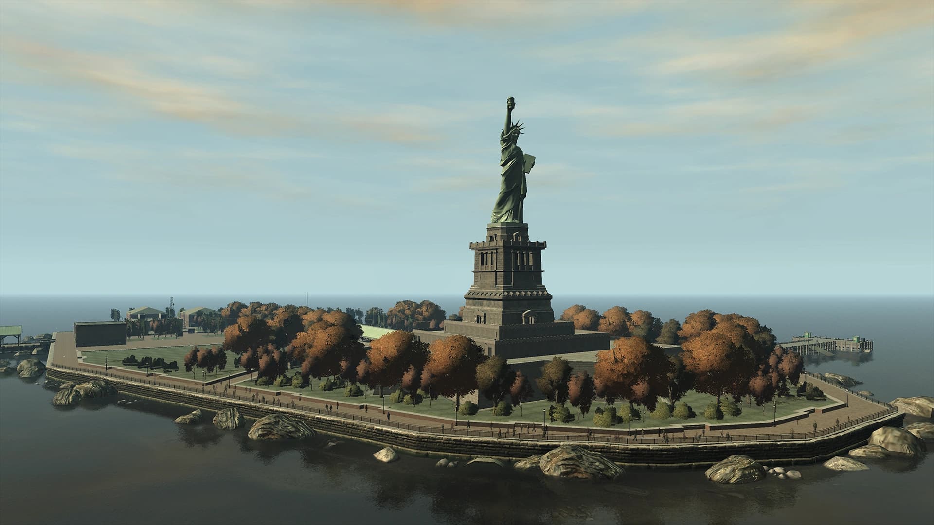 Happiness Island in Liberty City's harbour, the Statue of Happiness standing above autumn trees and a walled shoreline.