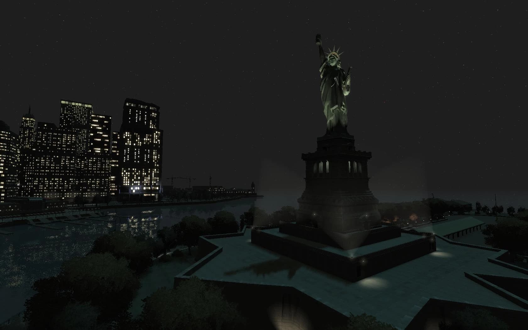 The Statue of Happiness on its island at dusk, holding a takeaway cup, with Algonquin lit across the water.