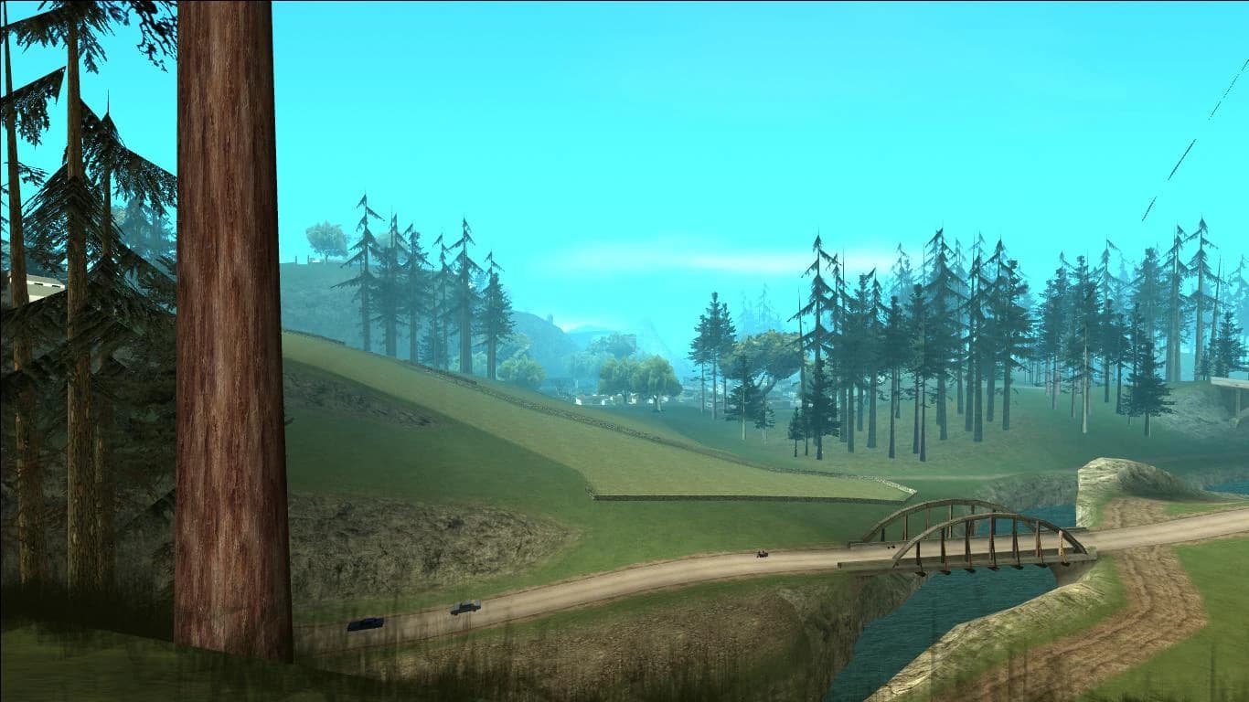 Red County's farmland and pine woods, a road bridge crossing the valley between them.