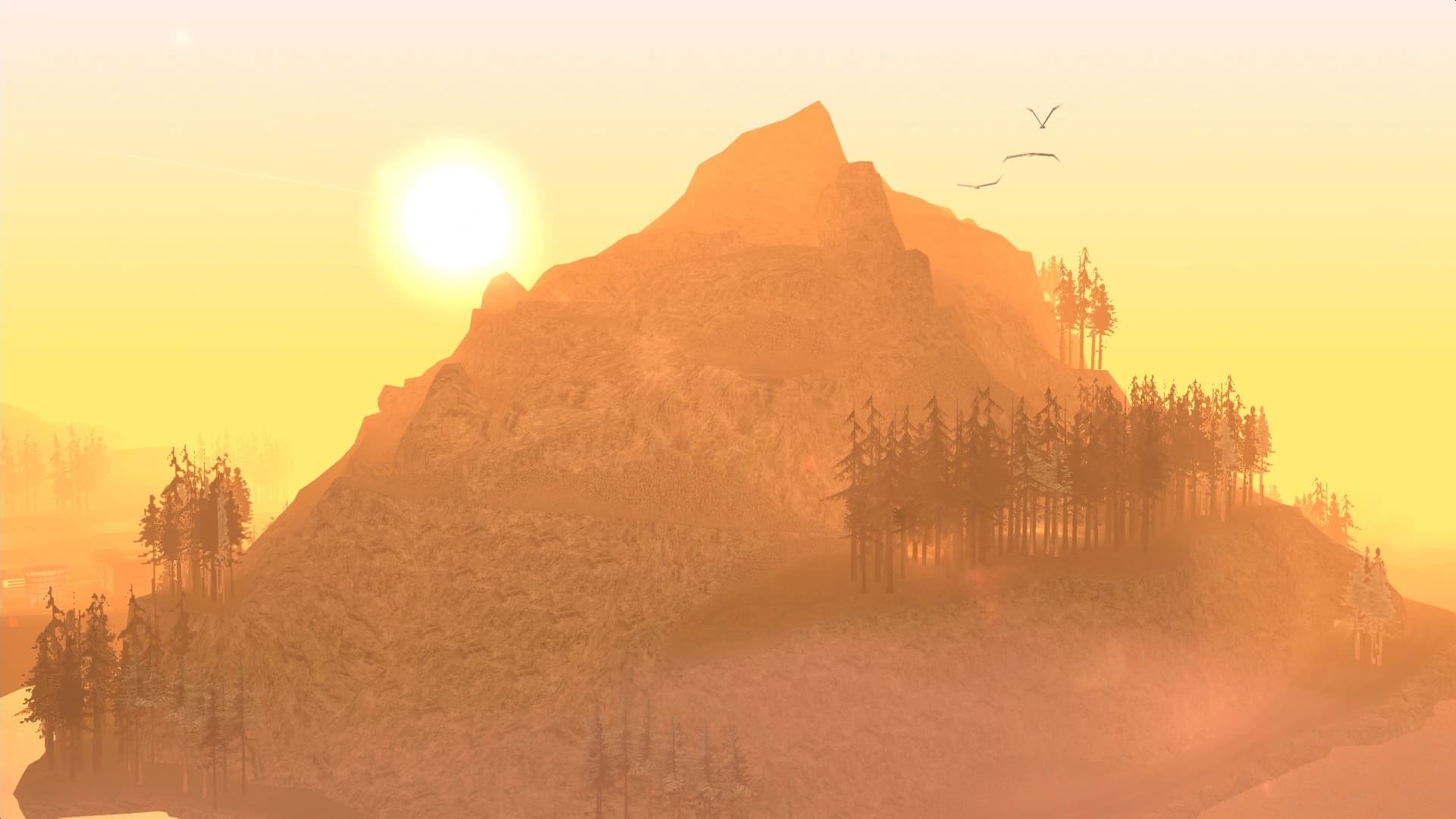 Mount Chiliad at first light, its wooded slopes rising above the coast and the road at its foot.