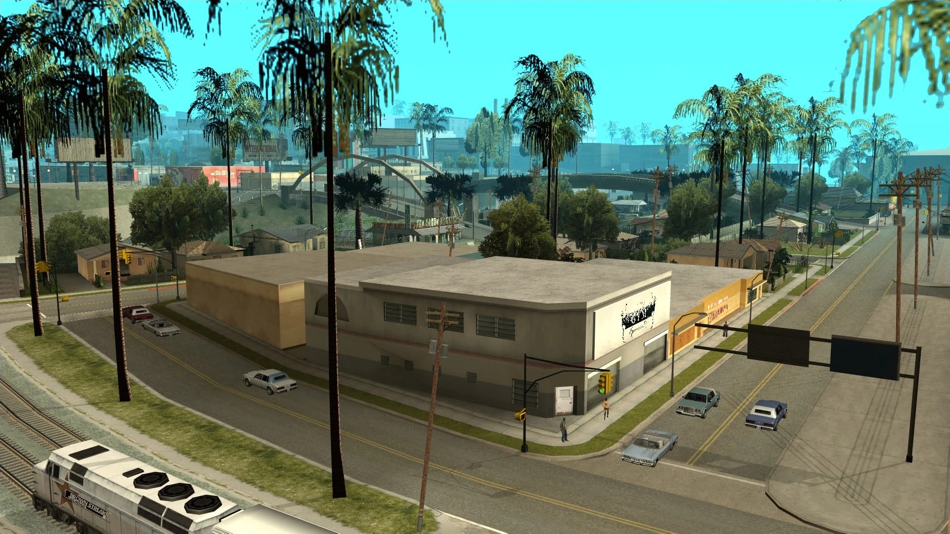 Ganton in south Los Santos, single-storey houses along the block with a railway running past.