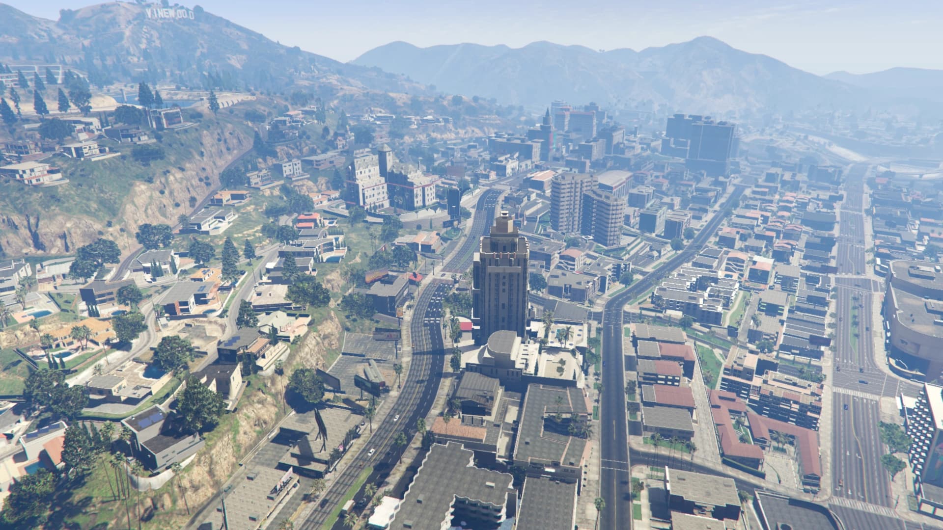 Vinewood from the air, the studios and boulevard below the hills.