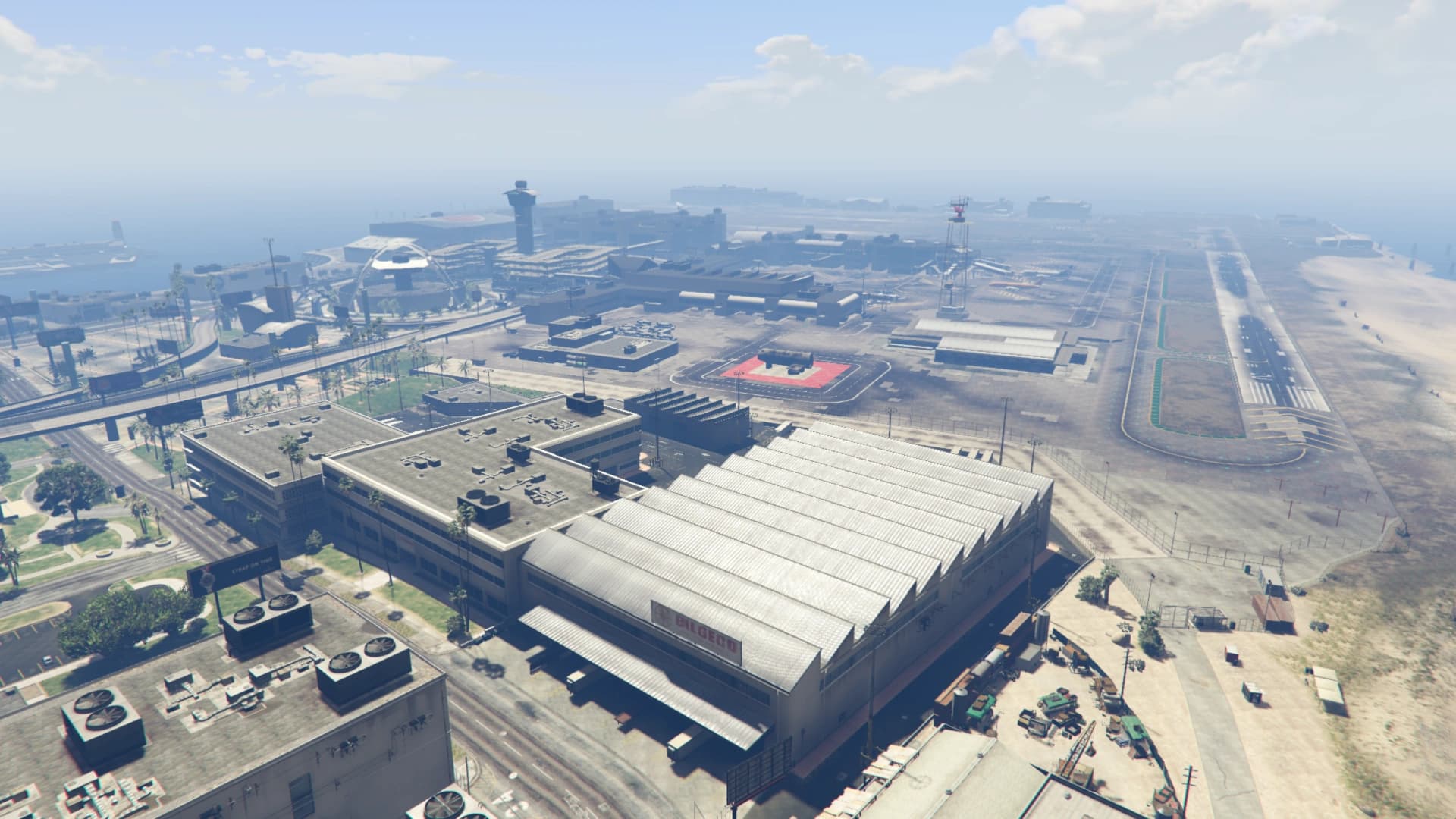 Los Santos International Airport from the air, terminals and runways along the shoreline.