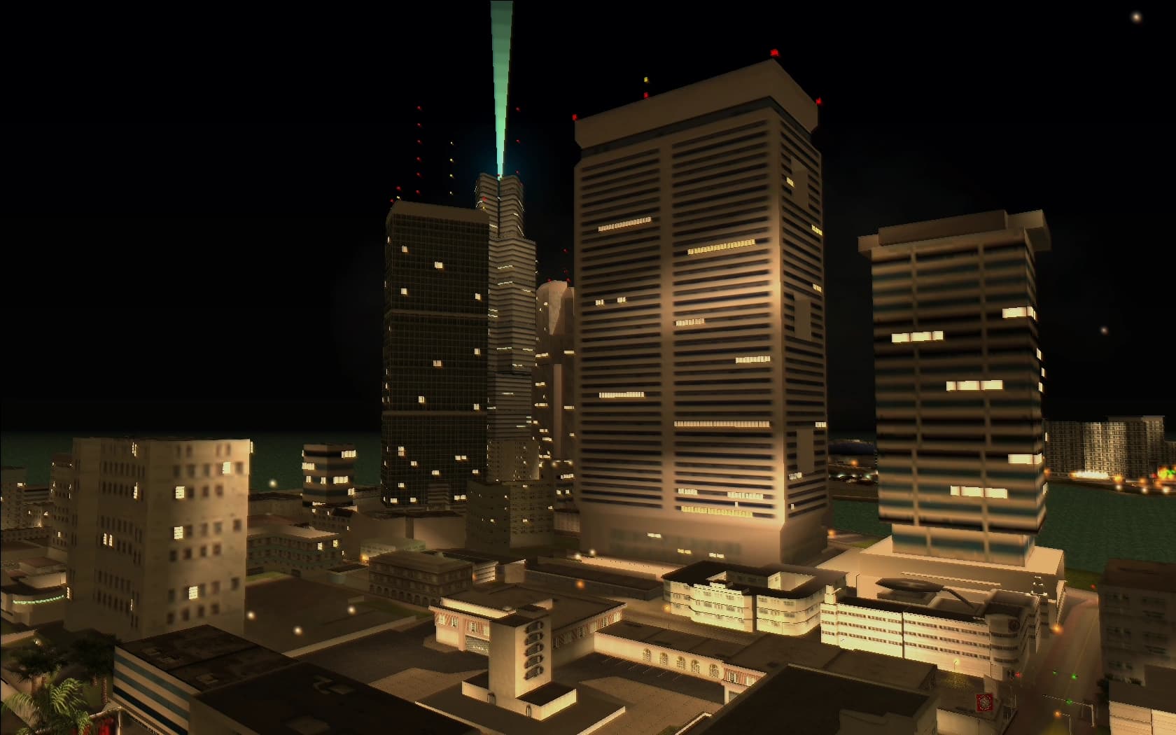 Downtown Vice City at night, dark office towers outlined in neon strips above the low blocks around them.