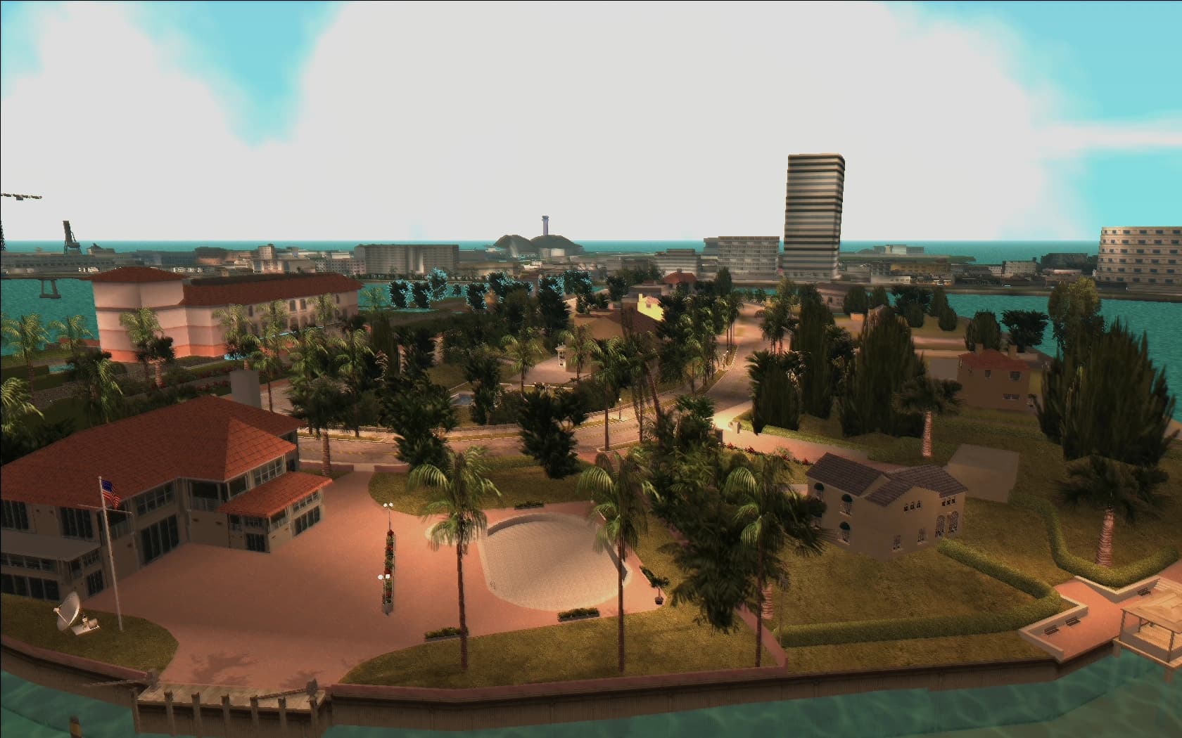 Starfish Island's walled houses and gardens on the water, the Vice City skyline behind.