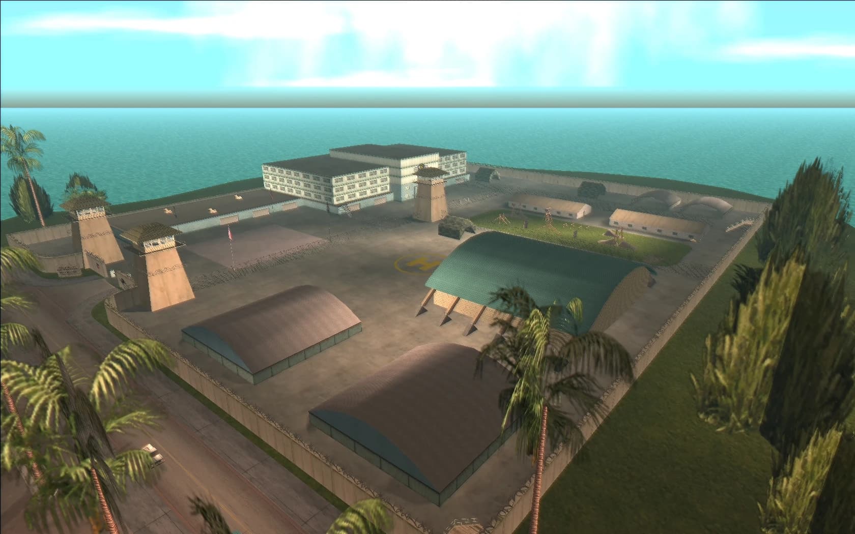 Fort Baxter Air Base behind its perimeter wall on the coast, barracks and hangars laid out in rows.