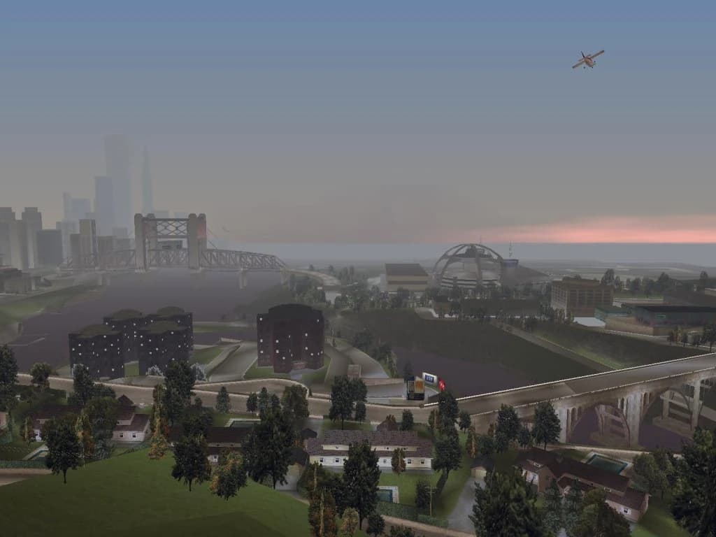 Shoreside Vale from the air, its suburbs and the lift bridge across the water to the rest of Liberty City.
