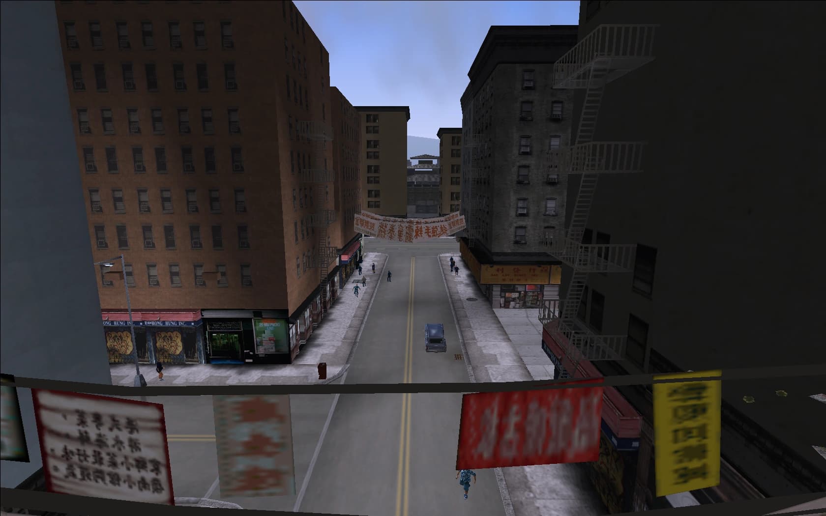Chinatown on Portland, a narrow street hung with red and yellow banners between brick tenements and fire escapes.