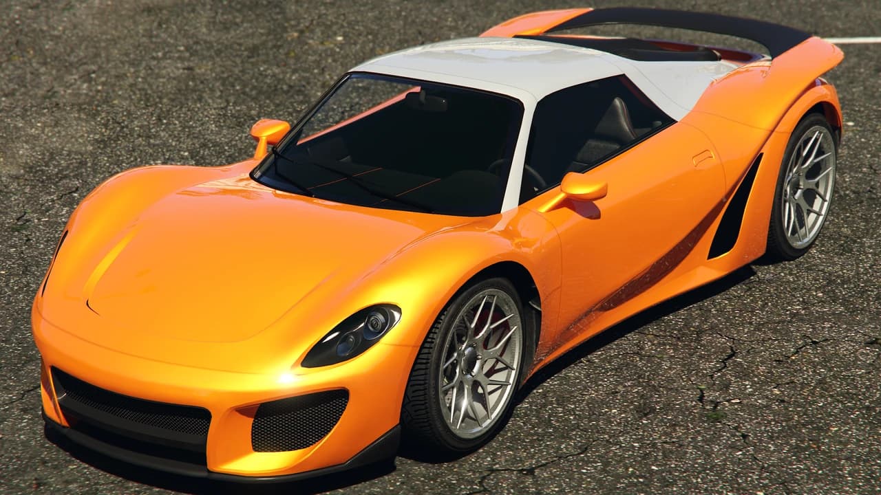 An orange Pfister 811 with a white roof, parked on tarmac.