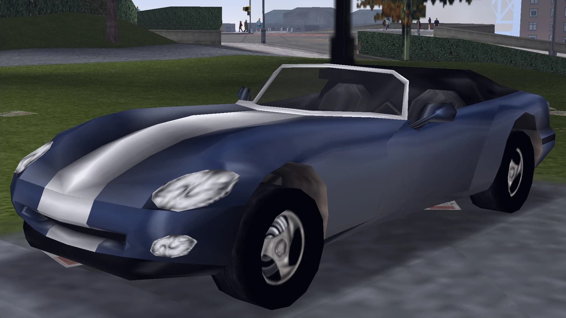 A dark blue Banshee roadster with a white centre stripe, front three-quarter view.