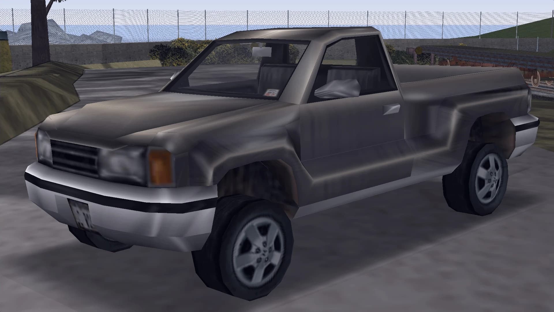 A grey Bobcat pickup truck, front three-quarter view.