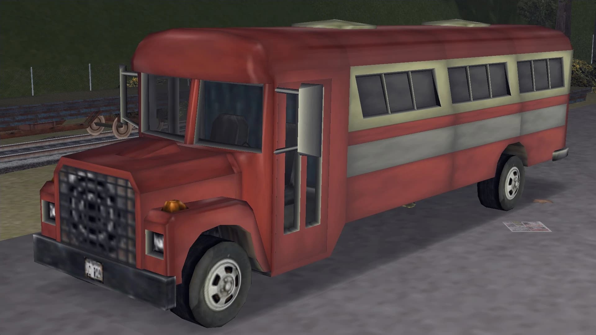 A red and cream Bus, front three-quarter view.