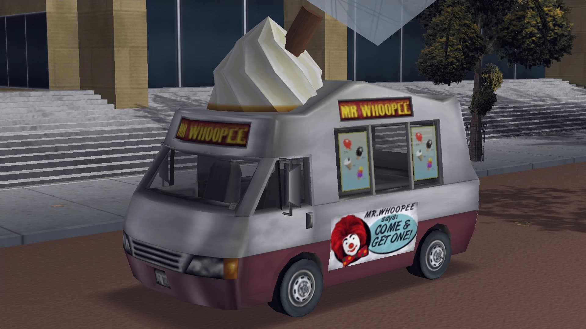 A white and maroon Mr Whoopee ice cream van with a giant cone on its roof, front three-quarter view.