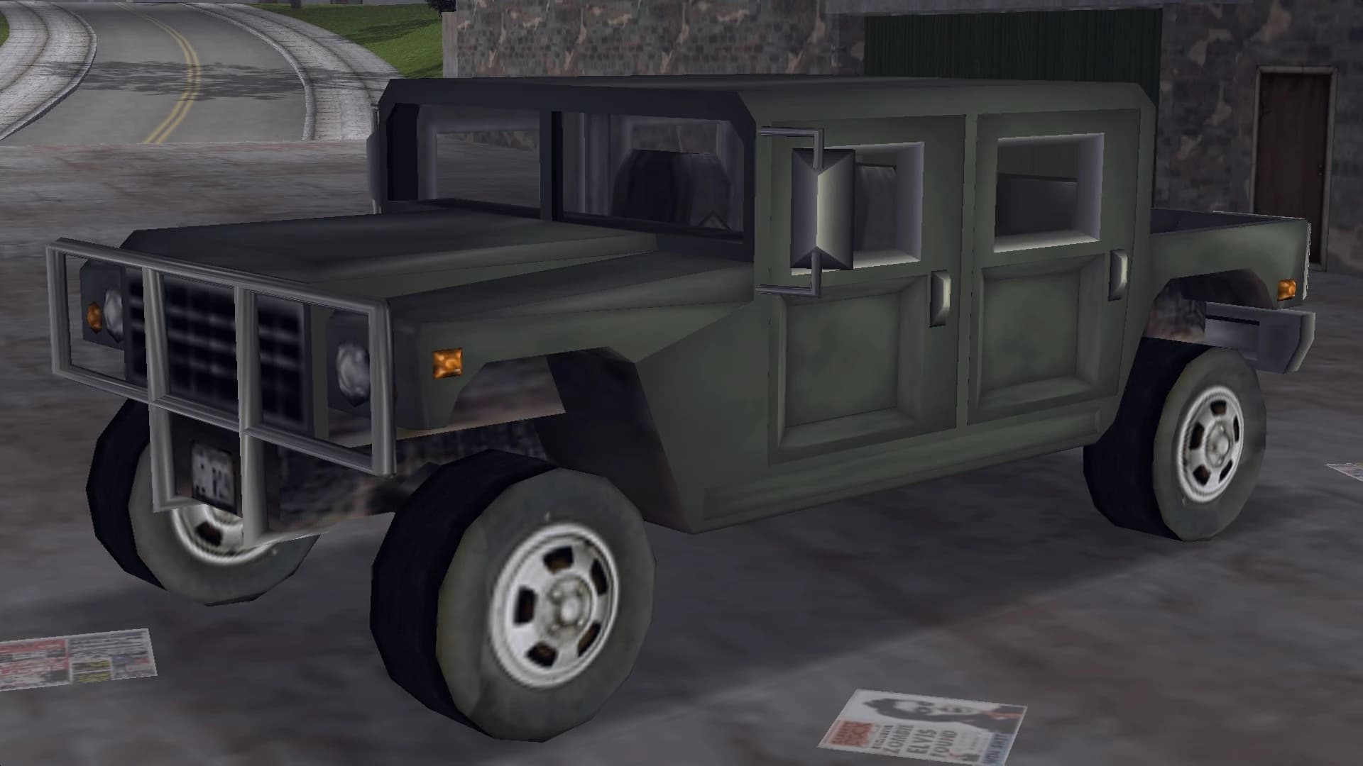 An olive green Patriot four-by-four with a tubular grille guard, front three-quarter view.