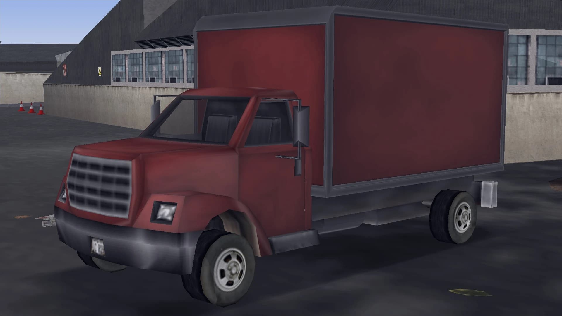 A red Yankee box truck, front three-quarter view.