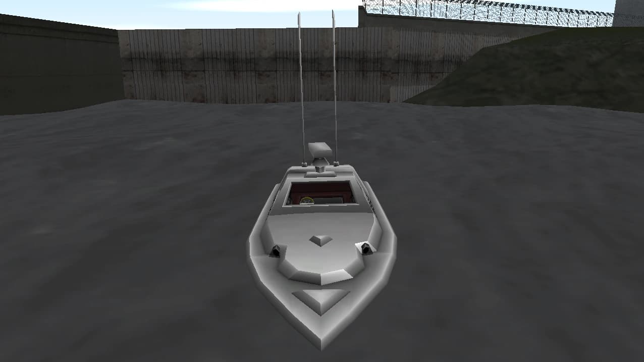 A white Predator police boat on the water, bow-on view.