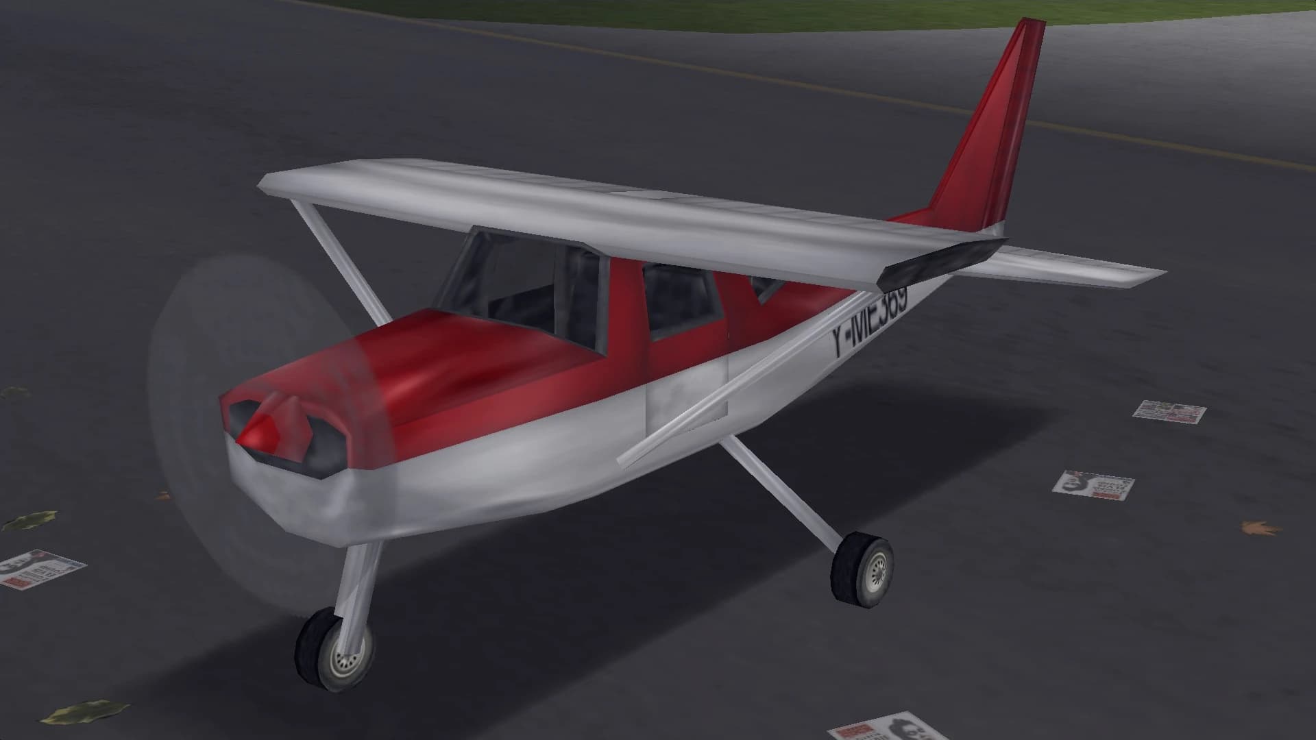A red and white Dodo light aircraft with clipped wings, front three-quarter view.