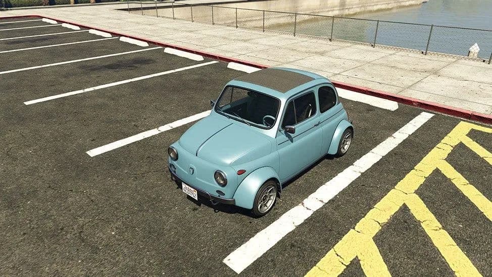 The Grotti Brioso 300 Widebody, a pale blue classic city car with flared arches, parked in a car park, in GTA Online.