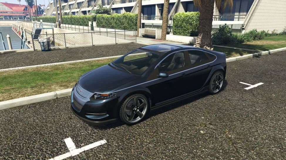 The Cheval Surge, a black electric four-door saloon, parked beside a lawn, in GTA Online.