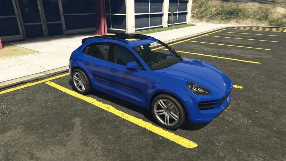 The Pfister Astron Custom, a blue compact luxury SUV, parked in a car park, in GTA Online.