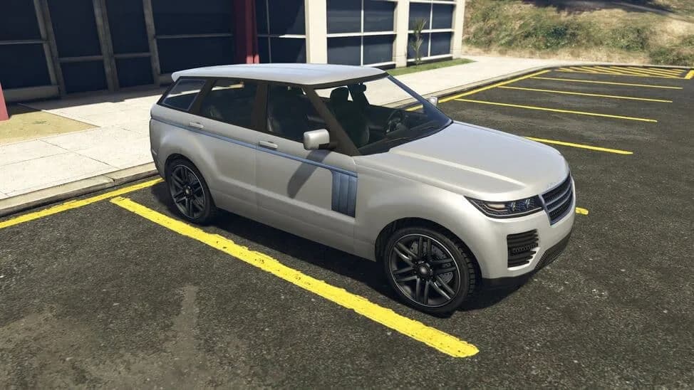 The Gallivanter Baller (Second Generation), a silver modern luxury SUV with side vents, parked in a car park, in GTA Online.