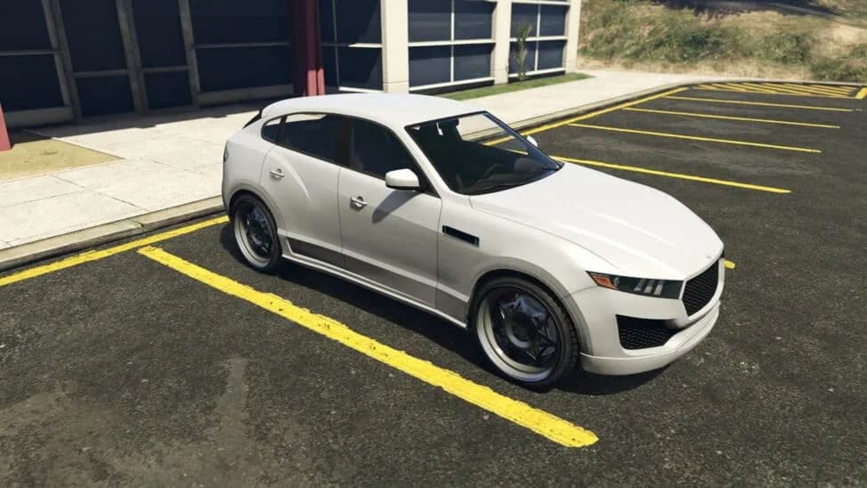 The Lampadati Novak, a white luxury crossover SUV, parked in a car park, in GTA Online.