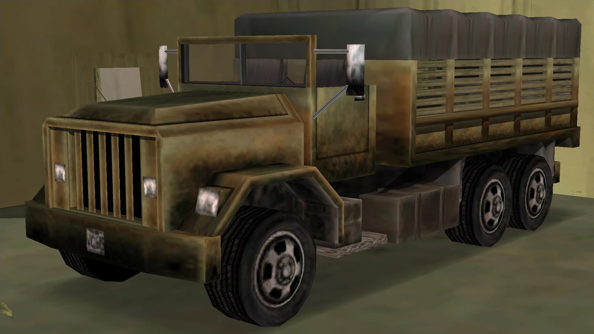 A camouflaged Barracks OL army truck with a canvas tilt over its bed, front three-quarter view.
