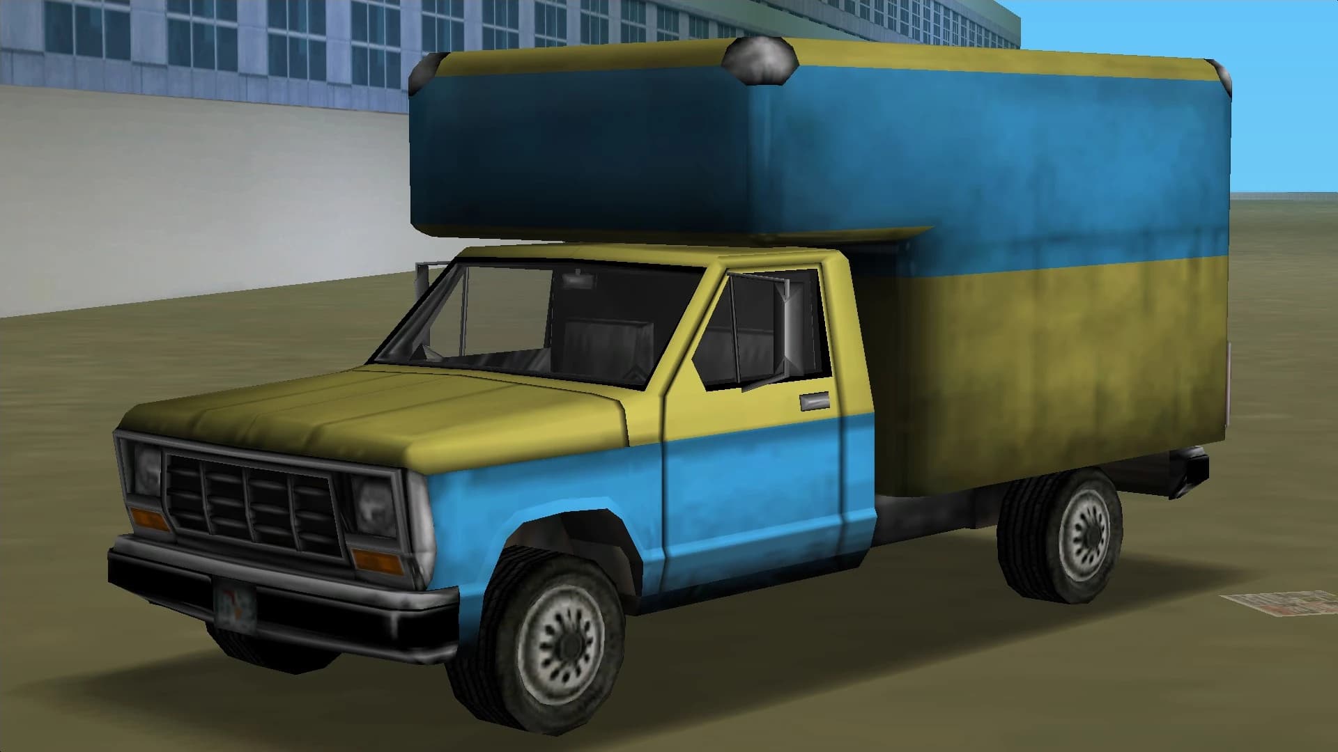 A yellow and blue Benson box truck, front three-quarter view.