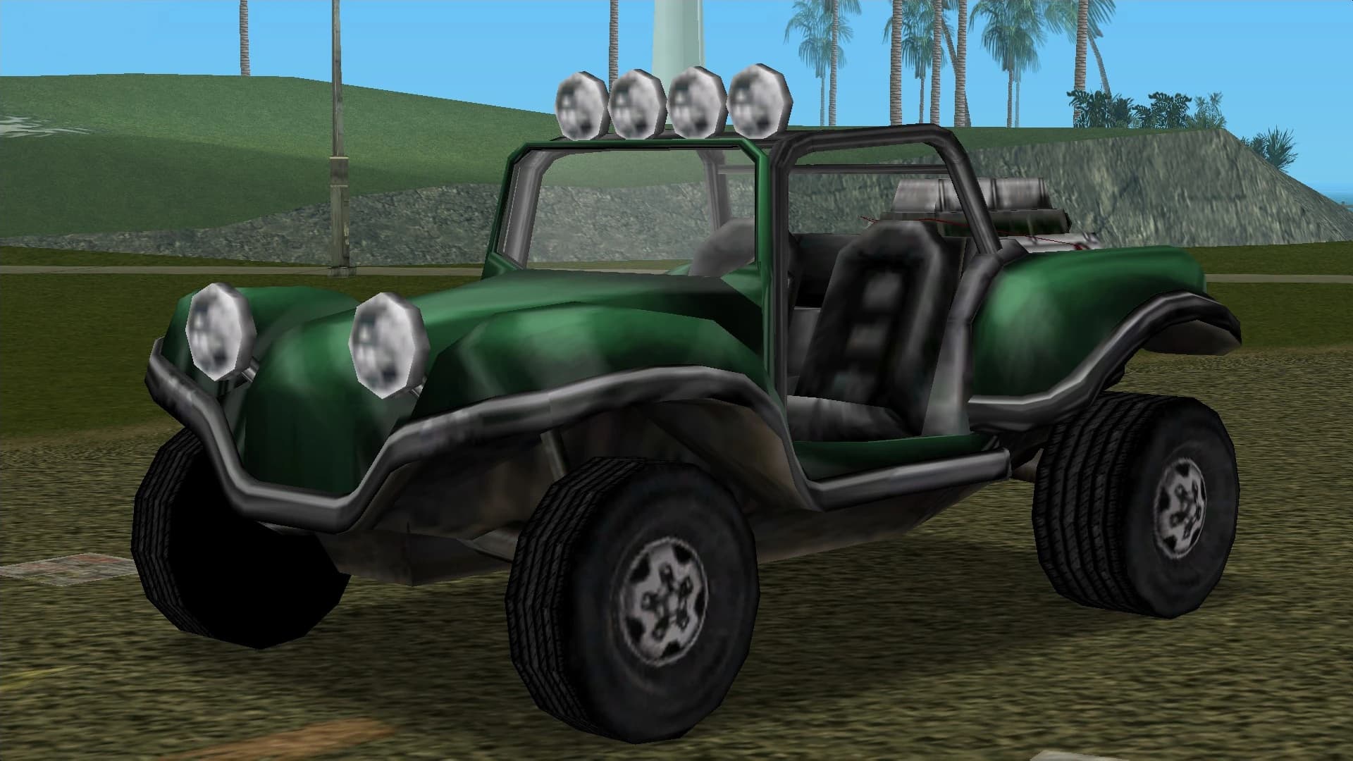 A green BF Injection dune buggy with roof-mounted spotlights, front three-quarter view.