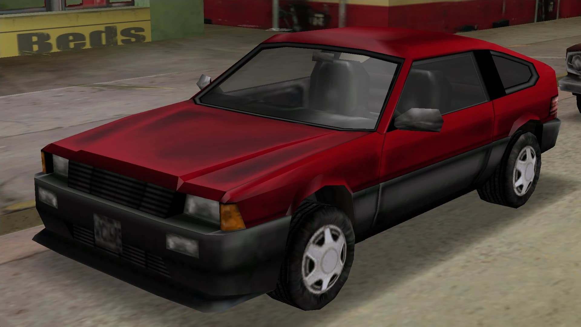 A red Blista Compact hatchback, front three-quarter view.