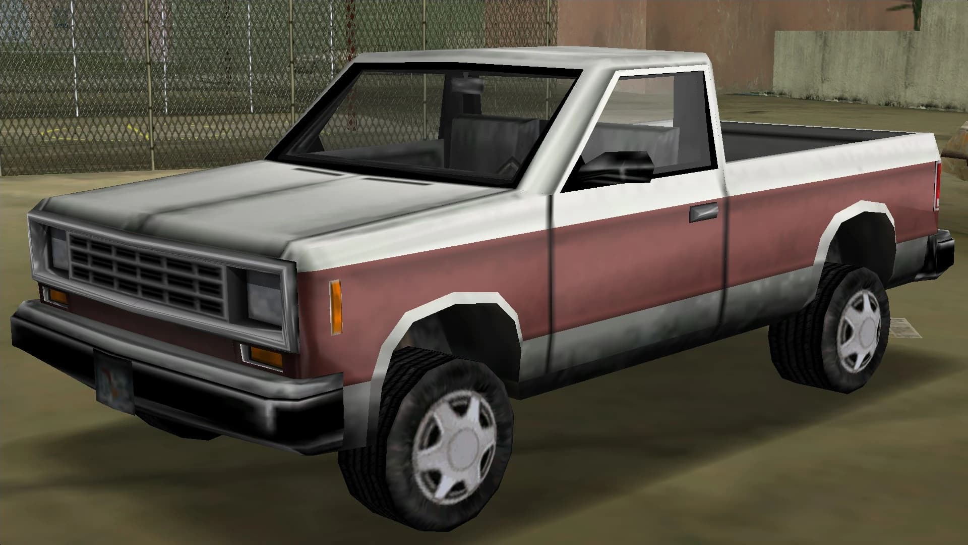 A white and maroon Bobcat pickup truck, front three-quarter view.