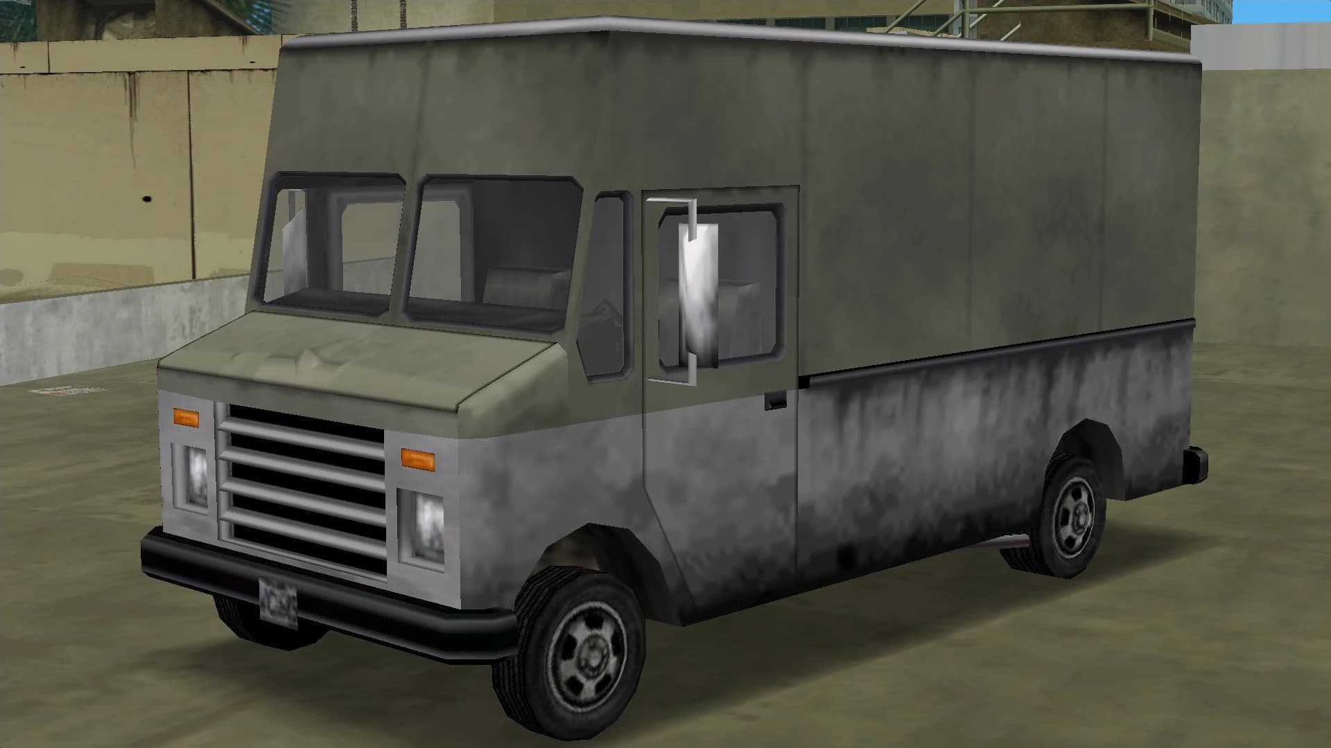 A grey Boxville delivery van, front three-quarter view.
