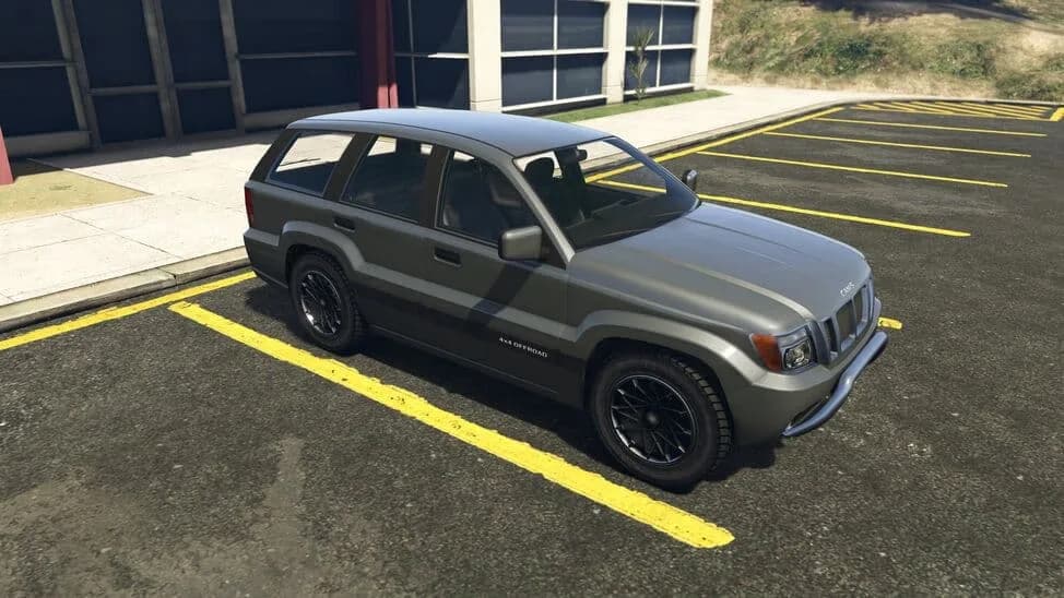The Canis Seminole, a grey mid-size SUV, parked in a car park, in GTA Online.
