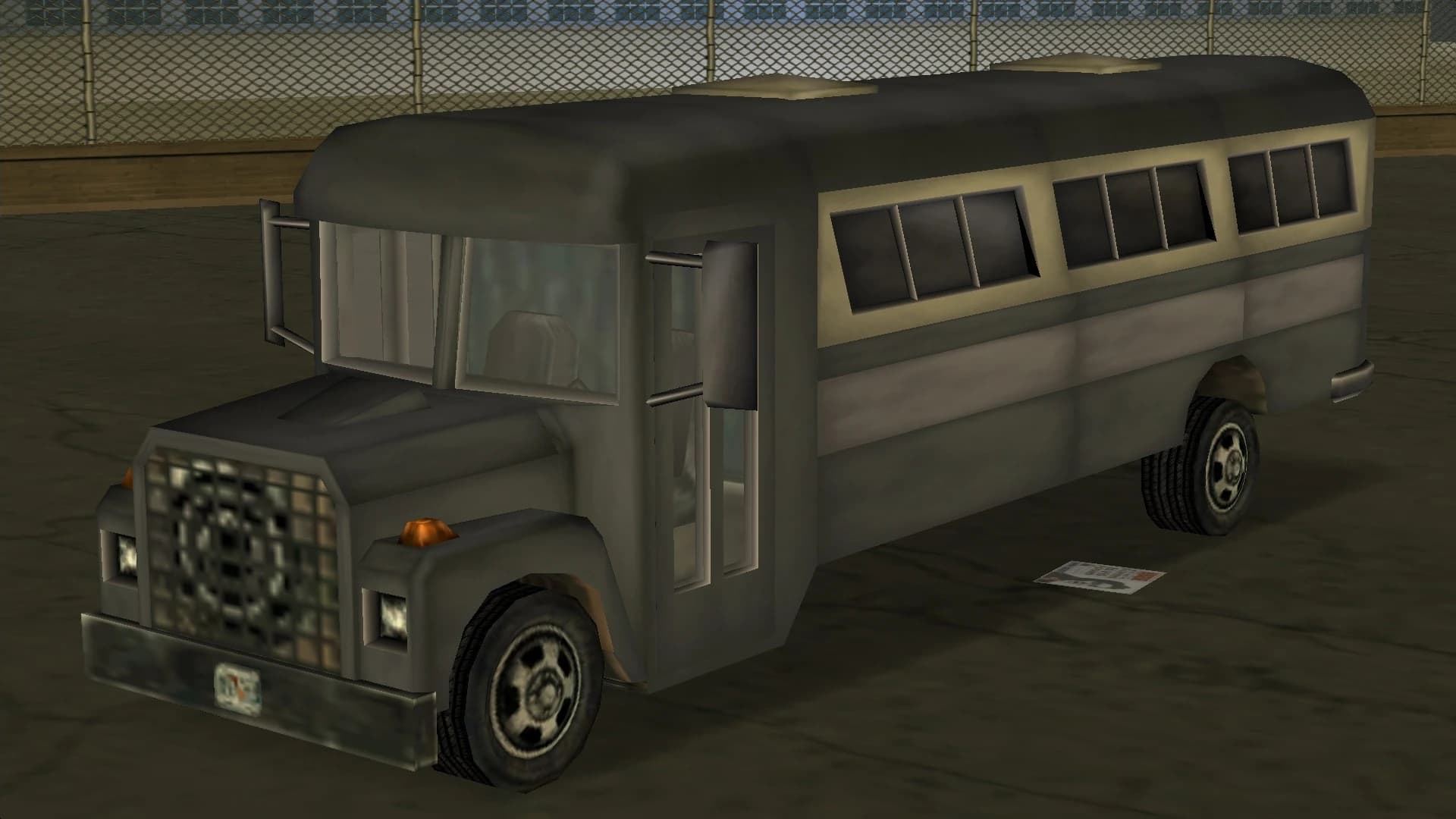 A grey and cream Bus, front three-quarter view.