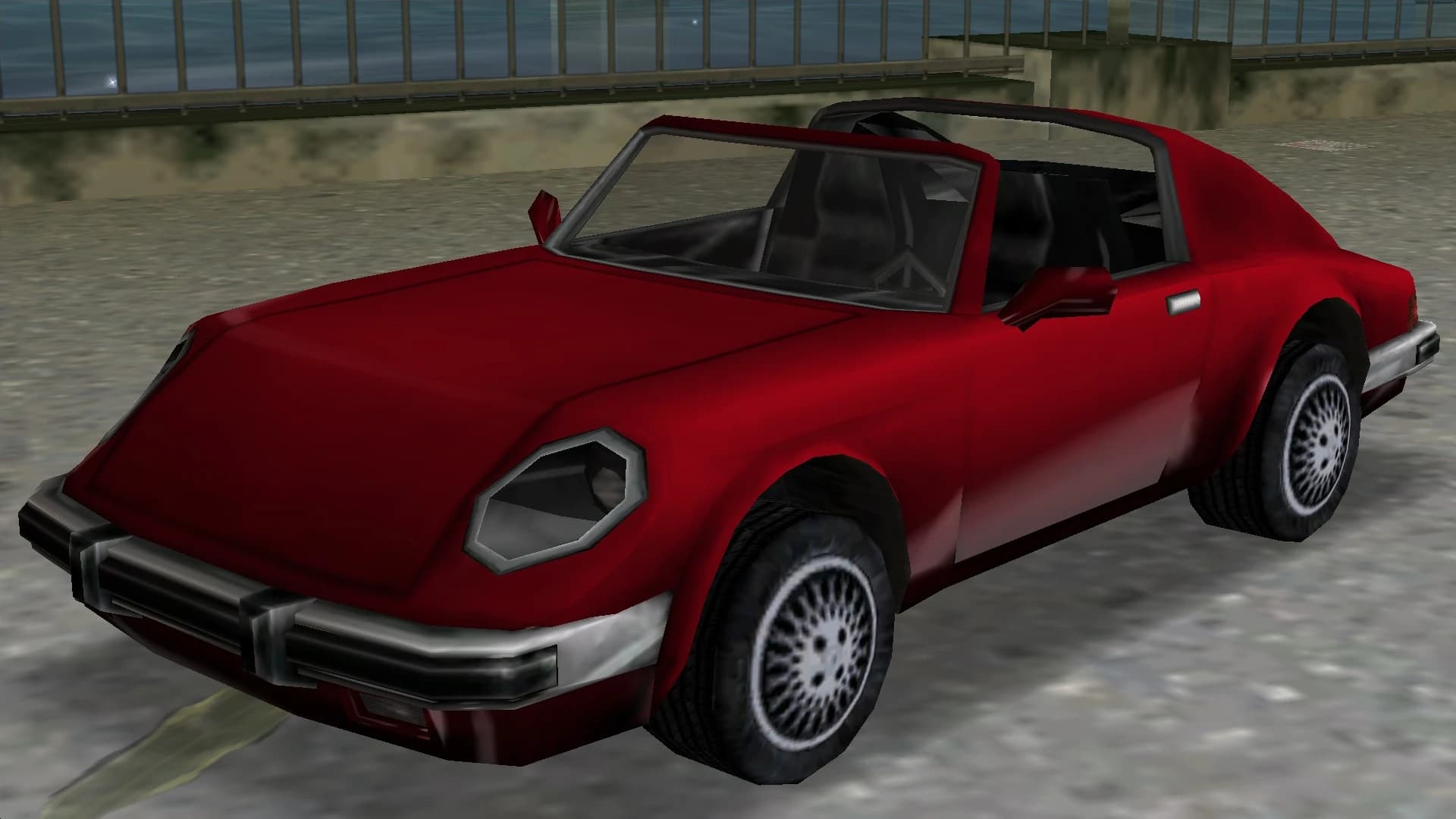 A red Comet with its targa roof panel removed, front three-quarter view.