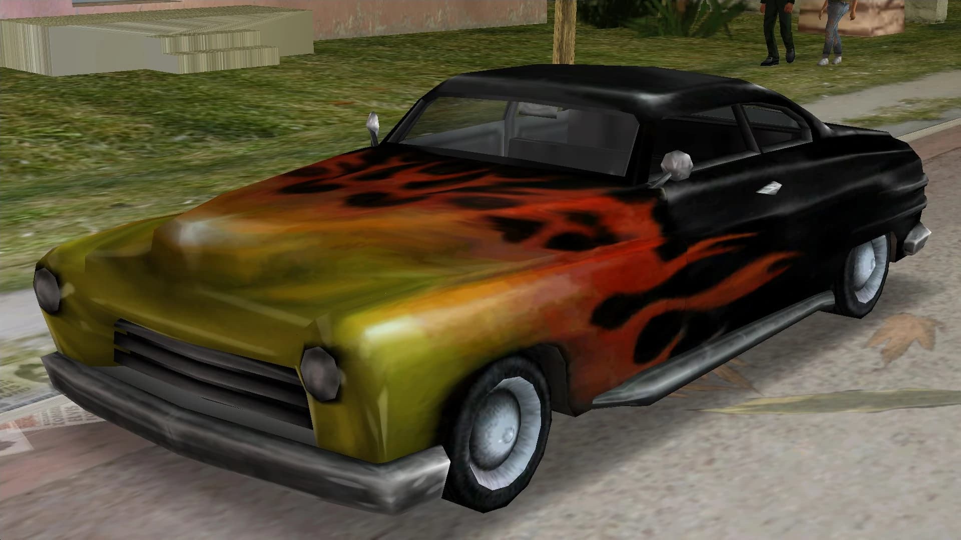 A Cuban Hermes coupe in black with orange and yellow flame graphics, front three-quarter view.
