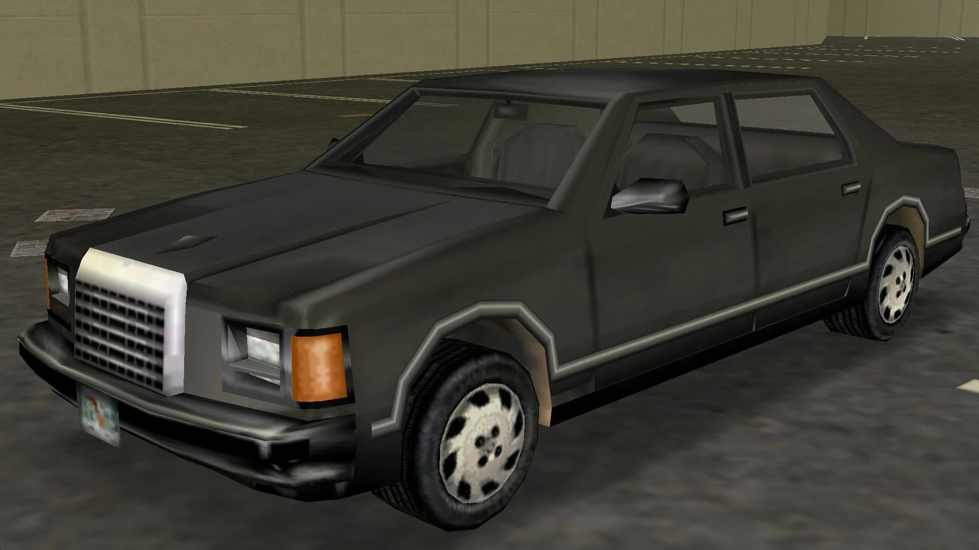 A dark grey FBI Washington saloon, front three-quarter view.