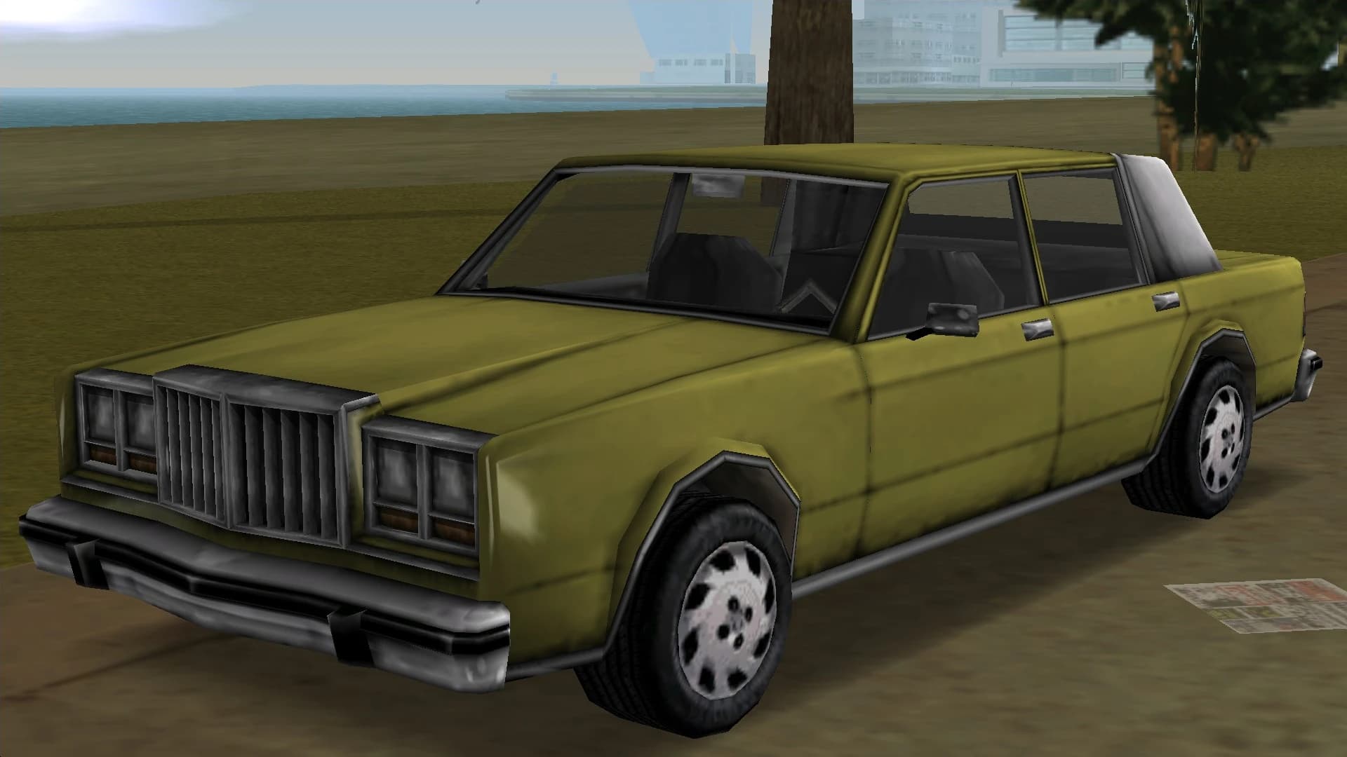 An olive Greenwood saloon, front three-quarter view.