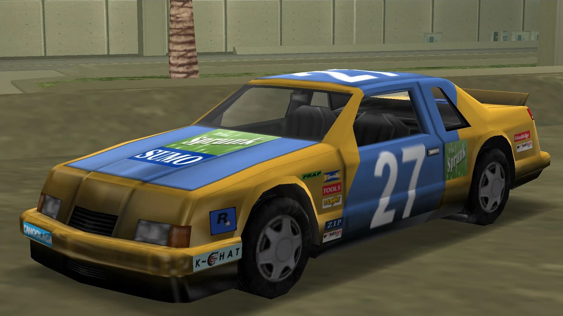 A yellow and blue stock car carrying race number 27 and sponsor decals, front three-quarter view.