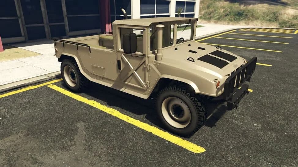 The Mammoth Squaddie, a tan military utility truck with an open rear bed, parked in a car park, in GTA Online.