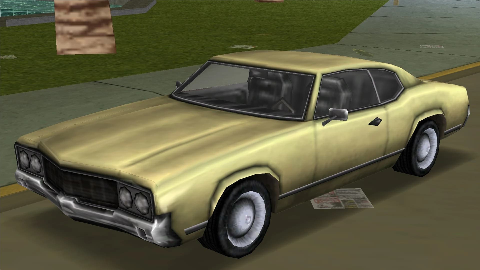 A cream Sabre muscle coupe, front three-quarter view.