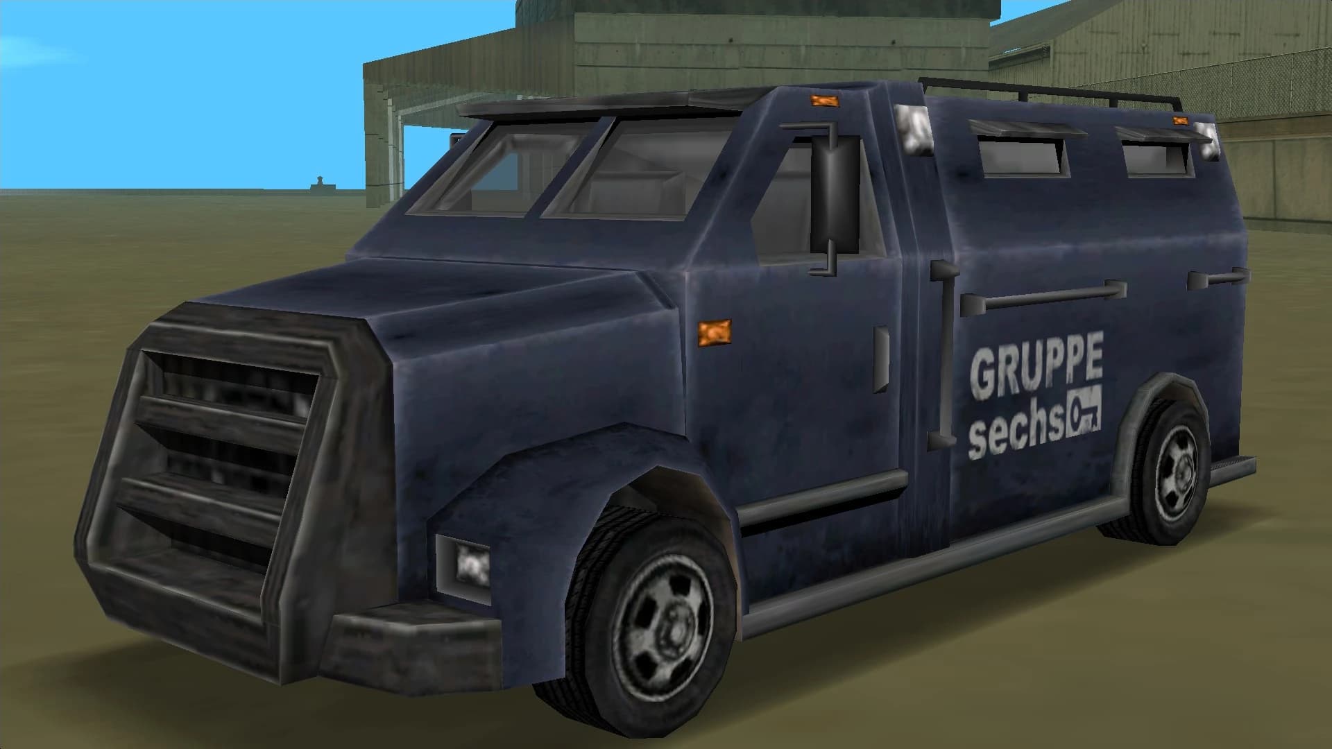 A dark blue Gruppe Sechs Securicar armoured van, front three-quarter view.