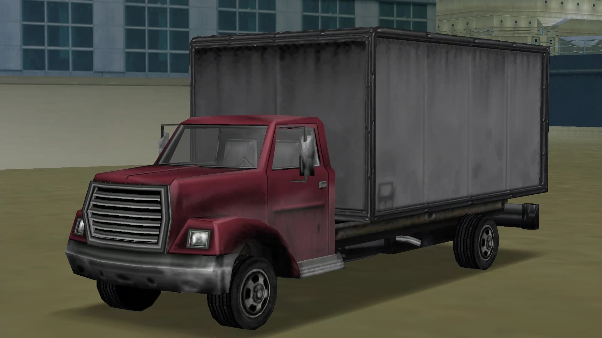 A red Yankee box truck, front three-quarter view.