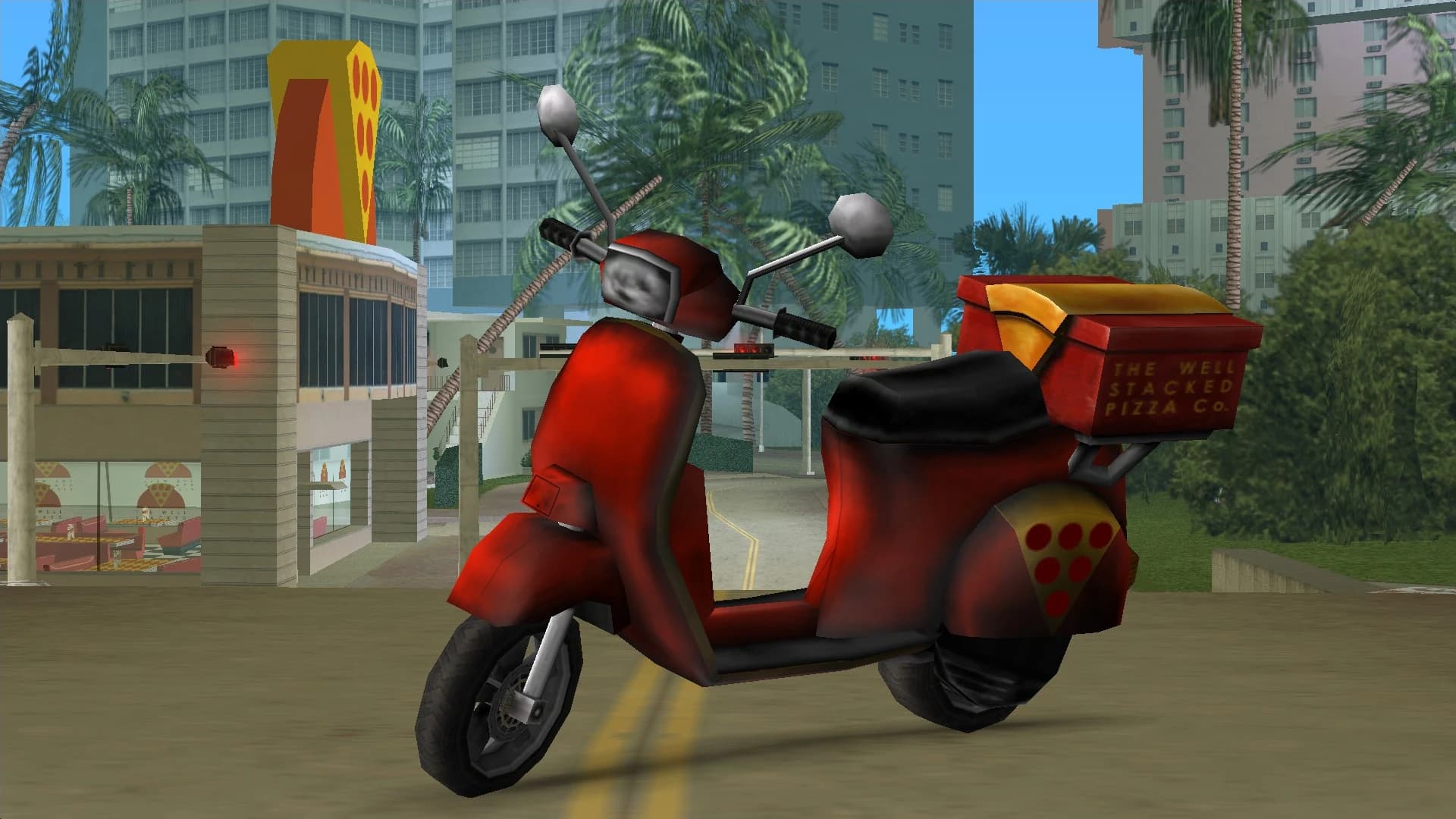 A red Pizza Boy scooter with a Well Stacked Pizza delivery box, side view.