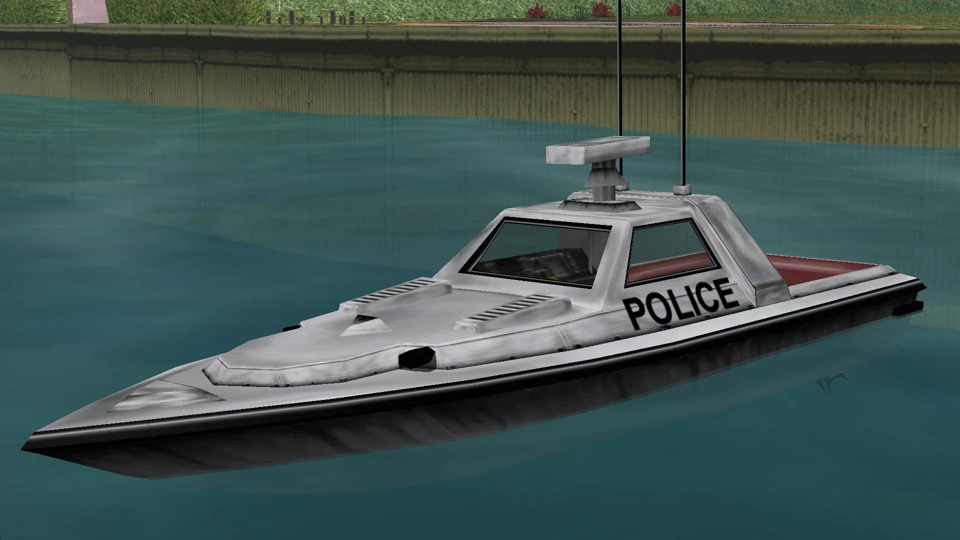A white Predator police boat lettered POLICE, on the water.