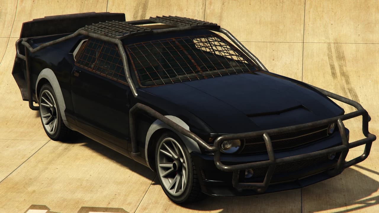 A black Vapid Apocalypse Dominator with mesh window guards and a tubular bull bar, front three-quarter view.