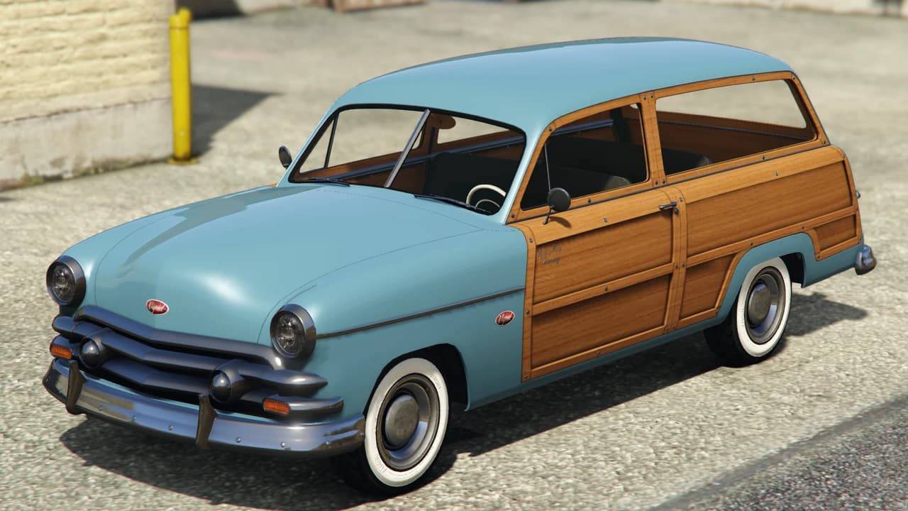 A pale blue Vapid Clique Wagon with wood-panelled sides, front three-quarter view.